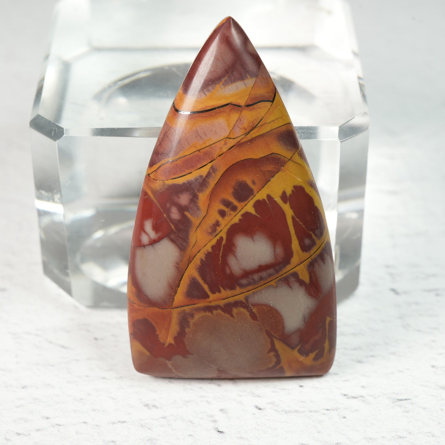 Polished gemstone cabochons in assorted shapes and sizes, natural crystal cabochons with smooth domed tops for artisan jewelry making and mineral collections.