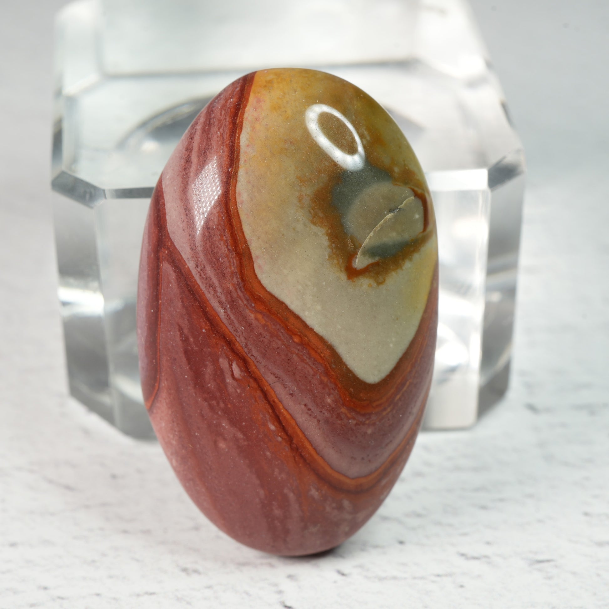 Polished gemstone cabochons in assorted shapes and sizes, natural crystal cabochons with smooth domed tops for artisan jewelry making and mineral collections.