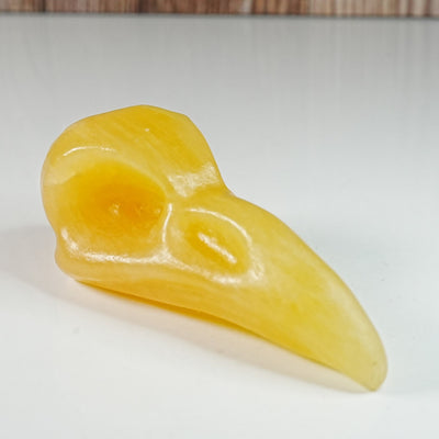 Yellow Calcite Crow Skull - Carving